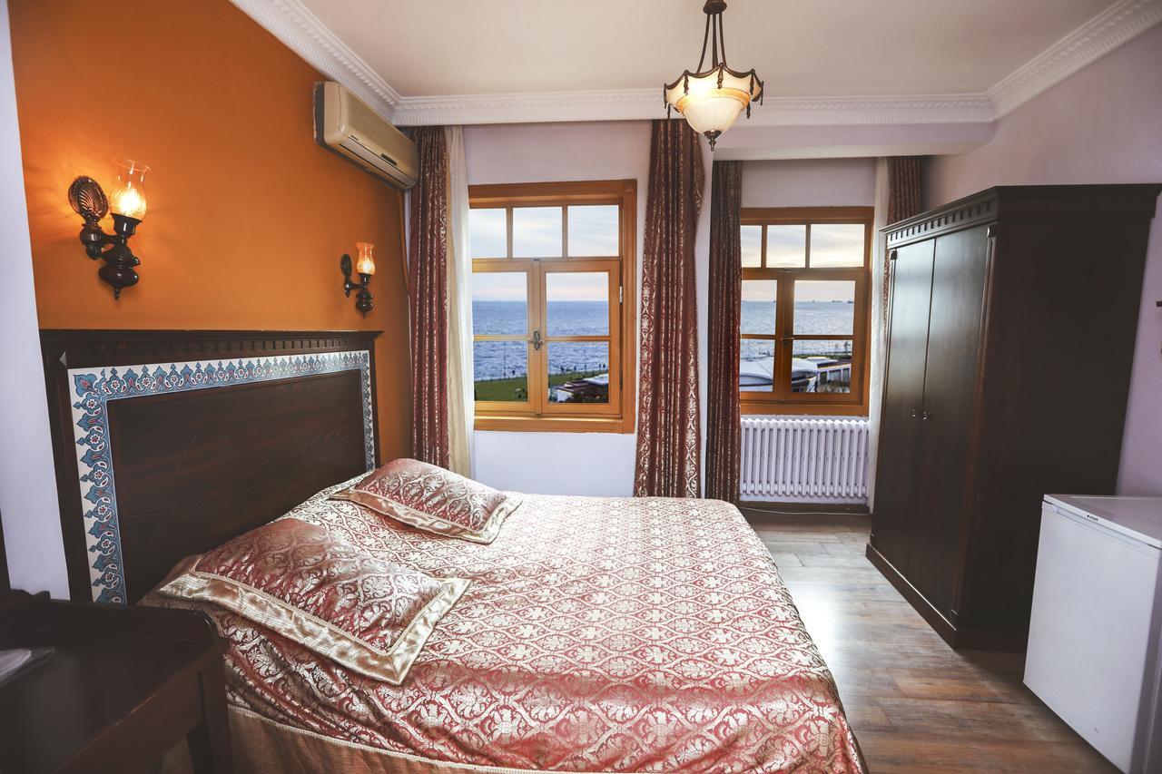 Cheers Vintage Hostel Estambul Exterior foto A bedroom in a hotel
